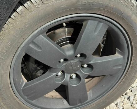 Черный Мицубиси Аутлендер, объемом двигателя 2.4 л и пробегом 258 тыс. км за 6300 $, фото 1 на Automoto.ua