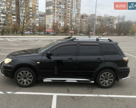 Черный Мицубиси Аутлендер, объемом двигателя 2.38 л и пробегом 314 тыс. км за 5000 $, фото 3 на Automoto.ua