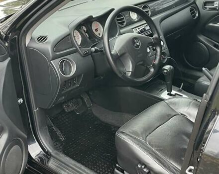 Чорний Міцубісі Аутлендер, об'ємом двигуна 2.4 л та пробігом 213 тис. км за 6850 $, фото 15 на Automoto.ua