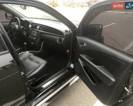 Черный Мицубиси Аутлендер, объемом двигателя 2.38 л и пробегом 314 тыс. км за 5000 $, фото 6 на Automoto.ua