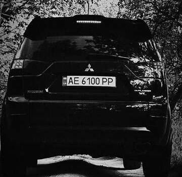 Черный Мицубиси Аутлендер, объемом двигателя 3 л и пробегом 190 тыс. км за 10000 $, фото 27 на Automoto.ua