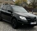 Міцубісі Аутлендер 2007 у Харкові на Automoto.ua Чорний Міцубісі Аутлендер, об'ємом двигуна 2.4 л та пробігом 240 тис. км за 5600 $, фото 3 на Automoto.ua