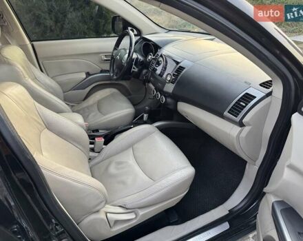 Черный Мицубиси Аутлендер, объемом двигателя 3 л и пробегом 205 тыс. км за 11300 $, фото 17 на Automoto.ua