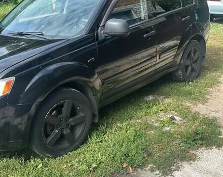 Черный Мицубиси Аутлендер, объемом двигателя 3 л и пробегом 257 тыс. км за 9200 $, фото 4 на Automoto.ua