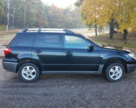 Мицубиси Аутлендер 2007 в Мироновке на Automoto.ua Черный Мицубиси Аутлендер, объемом двигателя 2 л и пробегом 278 тыс. км за 6500 $, фото 3 на Automoto.ua