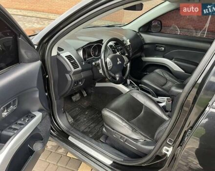 Черный Мицубиси Аутлендер, объемом двигателя 3 л и пробегом 200 тыс. км за 7999 $, фото 23 на Automoto.ua