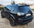 Черный Мицубиси Аутлендер, объемом двигателя 3 л и пробегом 225 тыс. км за 9200 $, фото 3 на Automoto.ua
