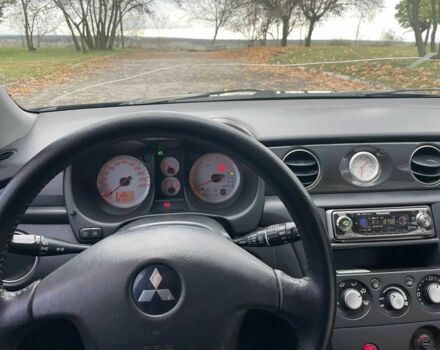 Черный Мицубиси Аутлендер, объемом двигателя 2.4 л и пробегом 213 тыс. км за 6850 $, фото 18 на Automoto.ua