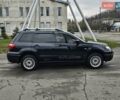 Черный Мицубиси Аутлендер, объемом двигателя 2 л и пробегом 290 тыс. км за 4000 $, фото 1 на Automoto.ua