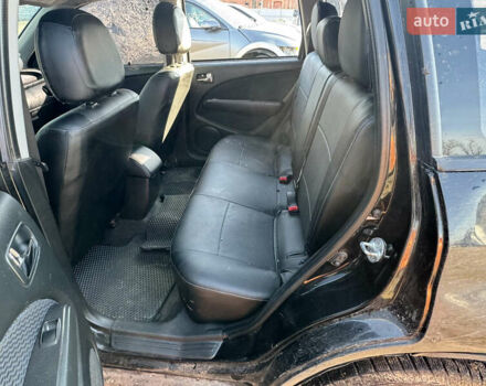 Черный Мицубиси Аутлендер, объемом двигателя 2 л и пробегом 258 тыс. км за 2200 $, фото 18 на Automoto.ua