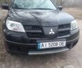 Чорний Міцубісі Аутлендер, об'ємом двигуна 2 л та пробігом 245 тис. км за 5400 $, фото 9 на Automoto.ua