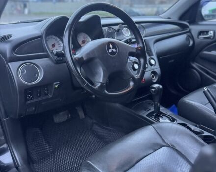 Чорний Міцубісі Аутлендер, об'ємом двигуна 2.4 л та пробігом 202 тис. км за 5800 $, фото 11 на Automoto.ua