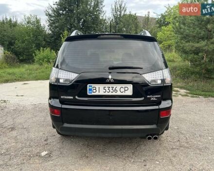Чорний Міцубісі Аутлендер, об'ємом двигуна 3 л та пробігом 260 тис. км за 10700 $, фото 7 на Automoto.ua