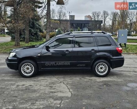 Чорний Міцубісі Аутлендер, об'ємом двигуна 2 л та пробігом 290 тис. км за 5000 $, фото 6 на Automoto.ua