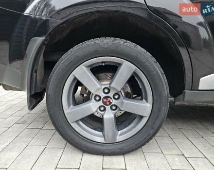 Черный Мицубиси Аутлендер, объемом двигателя 3 л и пробегом 238 тыс. км за 10800 $, фото 15 на Automoto.ua