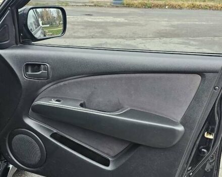 Черный Мицубиси Аутлендер, объемом двигателя 2 л и пробегом 200 тыс. км за 4900 $, фото 5 на Automoto.ua