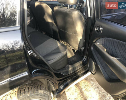 Черный Мицубиси Аутлендер, объемом двигателя 2.4 л и пробегом 260 тыс. км за 7200 $, фото 25 на Automoto.ua