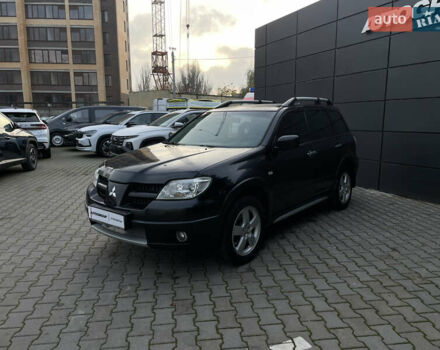 Черный Мицубиси Аутлендер, объемом двигателя 2.4 л и пробегом 248 тыс. км за 7300 $, фото 4 на Automoto.ua