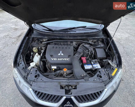 Черный Мицубиси Аутлендер, объемом двигателя 3 л и пробегом 202 тыс. км за 9999 $, фото 17 на Automoto.ua