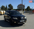 Чорний Міцубісі Аутлендер, об'ємом двигуна 2 л та пробігом 280 тис. км за 7500 $, фото 2 на Automoto.ua