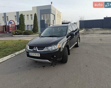 Черный Мицубиси Аутлендер, объемом двигателя 3 л и пробегом 155 тыс. км за 9800 $, фото 2 на Automoto.ua