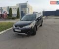 Черный Мицубиси Аутлендер, объемом двигателя 3 л и пробегом 155 тыс. км за 9800 $, фото 2 на Automoto.ua