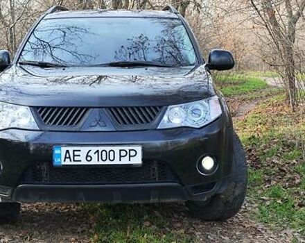 Черный Мицубиси Аутлендер, объемом двигателя 3 л и пробегом 190 тыс. км за 10000 $, фото 2 на Automoto.ua