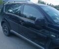 Черный Мицубиси Аутлендер, объемом двигателя 0 л и пробегом 305 тыс. км за 5000 $, фото 1 на Automoto.ua