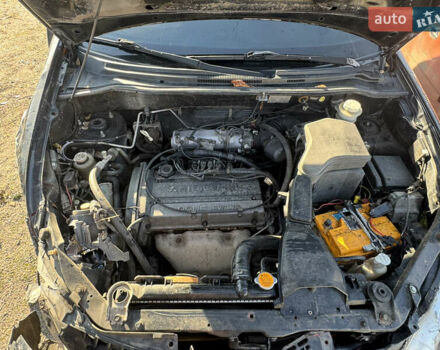 Черный Мицубиси Аутлендер, объемом двигателя 2 л и пробегом 258 тыс. км за 2200 $, фото 22 на Automoto.ua