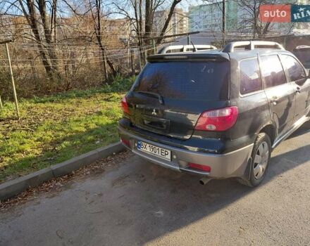 Чорний Міцубісі Аутлендер, об'ємом двигуна 2 л та пробігом 260 тис. км за 5500 $, фото 3 на Automoto.ua