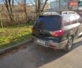 Чорний Міцубісі Аутлендер, об'ємом двигуна 2 л та пробігом 260 тис. км за 5500 $, фото 3 на Automoto.ua
