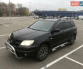 Черный Мицубиси Аутлендер, объемом двигателя 2.38 л и пробегом 314 тыс. км за 5000 $, фото 2 на Automoto.ua