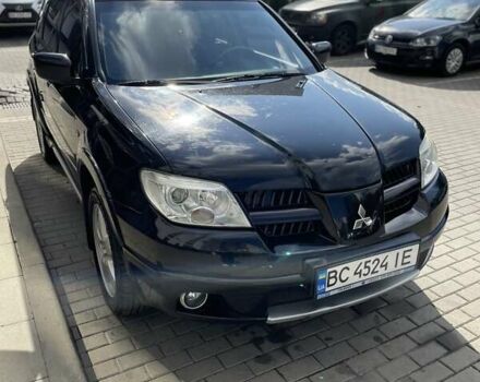 Черный Мицубиси Аутлендер, объемом двигателя 2.38 л и пробегом 310 тыс. км за 7500 $, фото 20 на Automoto.ua