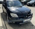 Черный Мицубиси Аутлендер, объемом двигателя 2.38 л и пробегом 310 тыс. км за 7500 $, фото 20 на Automoto.ua