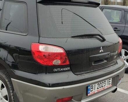 Чорний Міцубісі Аутлендер, об'ємом двигуна 2 л та пробігом 175 тис. км за 7800 $, фото 5 на Automoto.ua