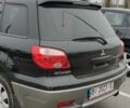 Чорний Міцубісі Аутлендер, об'ємом двигуна 2 л та пробігом 175 тис. км за 7800 $, фото 5 на Automoto.ua
