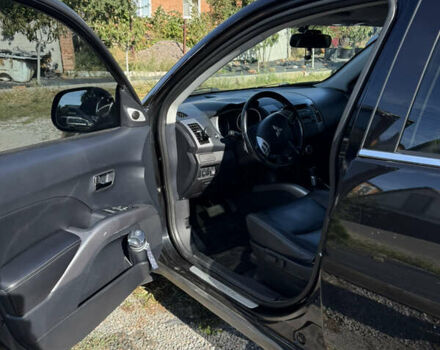 Черный Мицубиси Аутлендер, объемом двигателя 3 л и пробегом 180 тыс. км за 11200 $, фото 10 на Automoto.ua