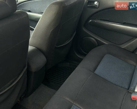 Черный Мицубиси Аутлендер, объемом двигателя 2.4 л и пробегом 320 тыс. км за 5999 $, фото 11 на Automoto.ua