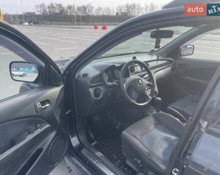 Черный Мицубиси Аутлендер, объемом двигателя 2.38 л и пробегом 180 тыс. км за 6900 $, фото 4 на Automoto.ua