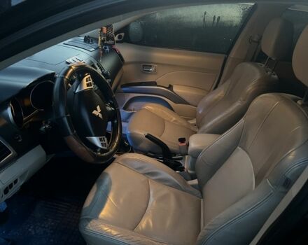 Черный Мицубиси Аутлендер, объемом двигателя 2 л и пробегом 288 тыс. км за 9200 $, фото 1 на Automoto.ua