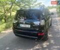 Черный Мицубиси Аутлендер, объемом двигателя 3 л и пробегом 250 тыс. км за 8100 $, фото 1 на Automoto.ua
