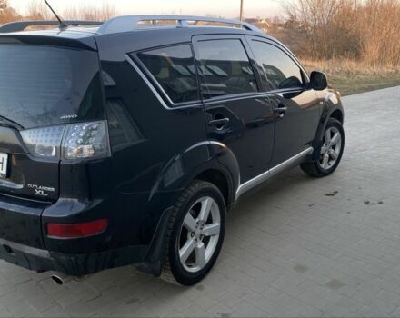 Чорний Міцубісі Аутлендер, об'ємом двигуна 2.4 л та пробігом 200 тис. км за 8300 $, фото 2 на Automoto.ua