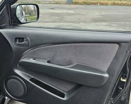 Чорний Міцубісі Аутлендер, об'ємом двигуна 2 л та пробігом 290 тис. км за 5000 $, фото 17 на Automoto.ua