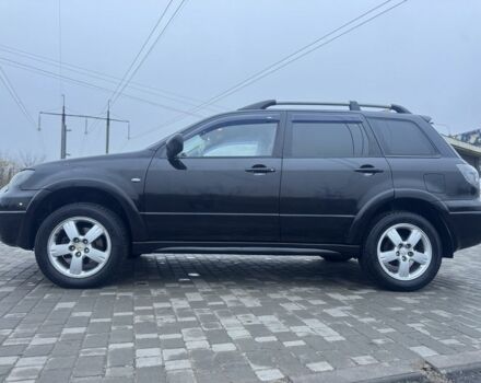 Чорний Міцубісі Аутлендер, об'ємом двигуна 2.4 л та пробігом 202 тис. км за 5800 $, фото 4 на Automoto.ua