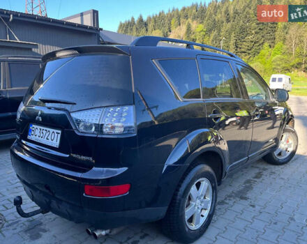 Чорний Міцубісі Аутлендер, об'ємом двигуна 2 л та пробігом 330 тис. км за 7500 $, фото 3 на Automoto.ua