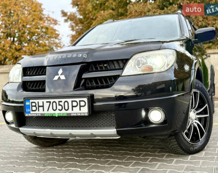 Міцубісі Аутлендер 2007 у Одесі на Automoto.ua Чорний Міцубісі Аутлендер, об'ємом двигуна 2.4 л та пробігом 201 тис. км за 7700 $, фото 36 на Automoto.ua