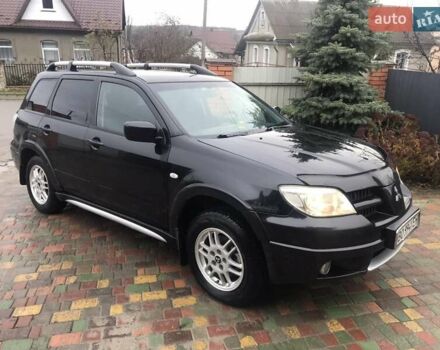 Черный Мицубиси Аутлендер, объемом двигателя 2 л и пробегом 284 тыс. км за 4500 $, фото 12 на Automoto.ua