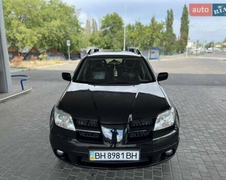 Чорний Міцубісі Аутлендер, об'ємом двигуна 2.38 л та пробігом 240 тис. км за 7900 $, фото 1 на Automoto.ua