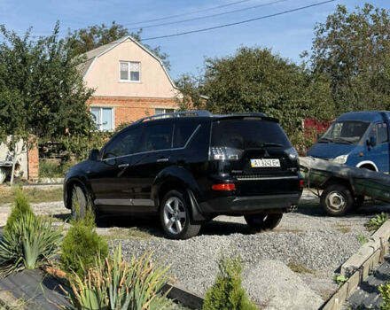 Черный Мицубиси Аутлендер, объемом двигателя 3 л и пробегом 180 тыс. км за 11200 $, фото 2 на Automoto.ua