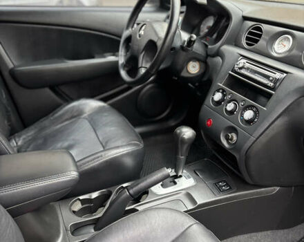 Чорний Міцубісі Аутлендер, об'ємом двигуна 2.4 л та пробігом 169 тис. км за 8000 $, фото 6 на Automoto.ua